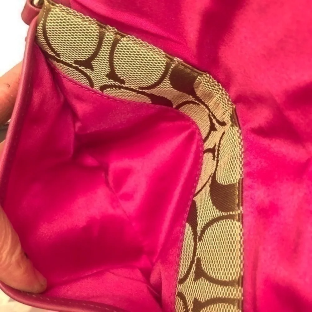 Coach signature brown dark pink leather wristlet